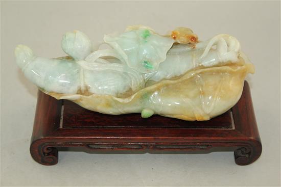 A large Chinese jadeite lotus carving, 20th century, 20.3cm, wood stand